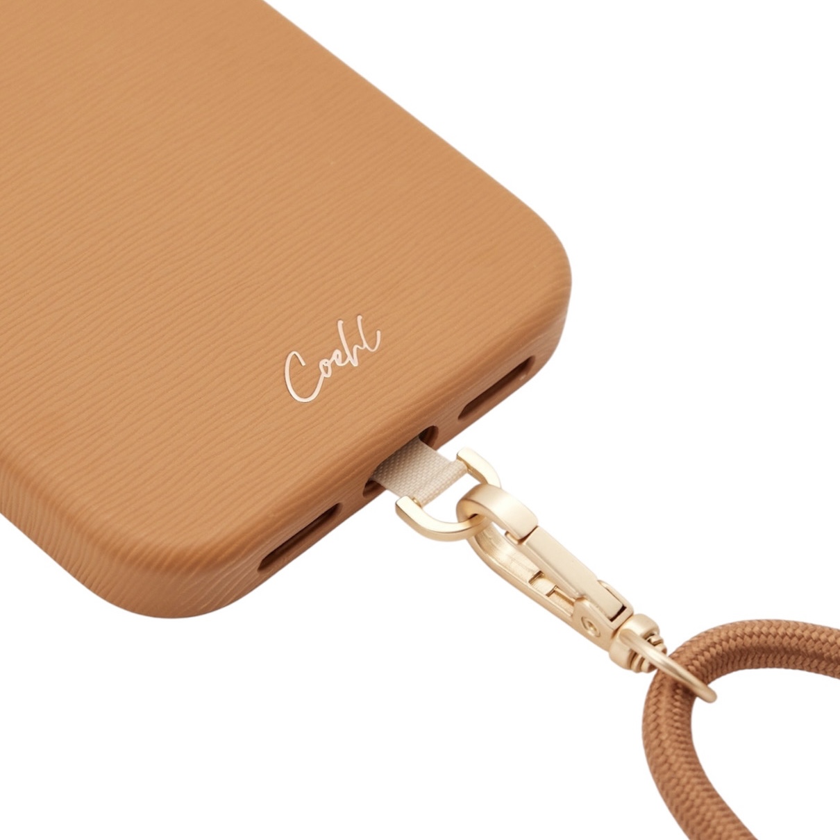 На фото изображено Чехол Uniq Coehl Strap Merelle (MagSafe) для iPhone 17 Pro Max, коричневый